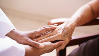 senior citizen hands elderly Alzheimer's thegrio.com