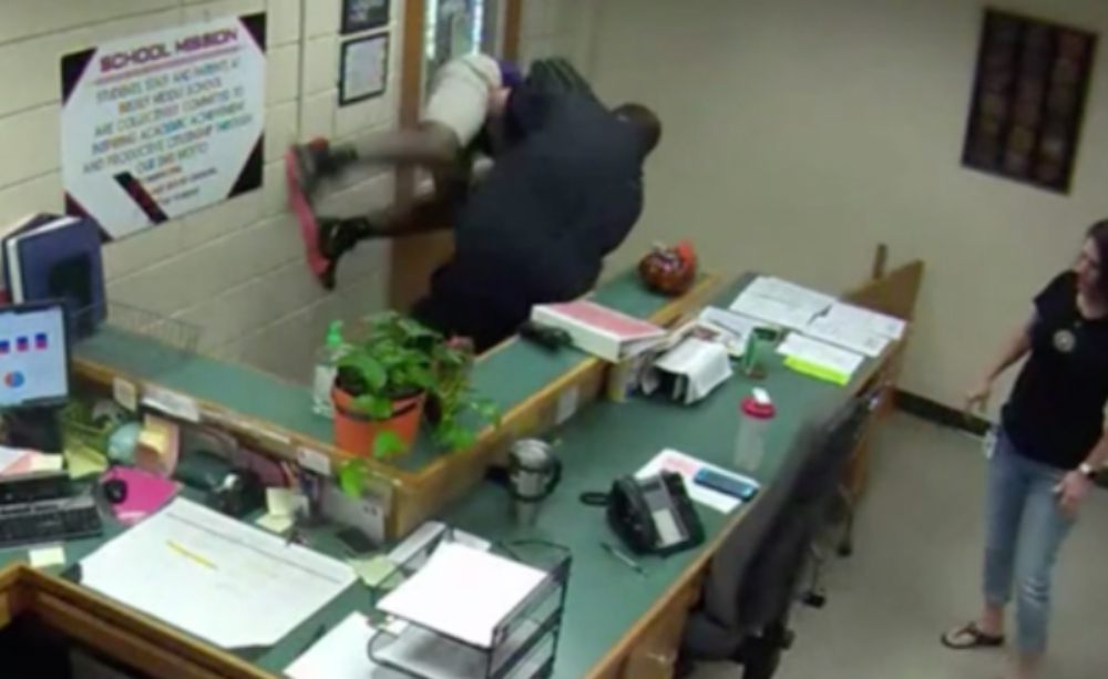 Police officer seen on video body slamming student