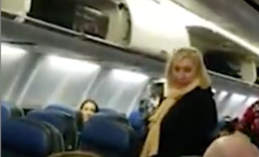 White woman escorted off of airplane after harassing Black couple thegrio.com