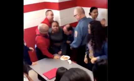 Video of a Black female Hazeltown Area High School student being brutally restrained by four security officers has gone viral. (Twitter)