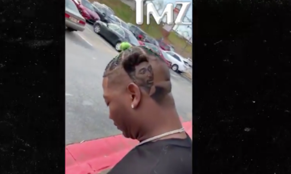 Yung Joc shows off new hair cut featuring Tupac. (TMZ) thegrio.com