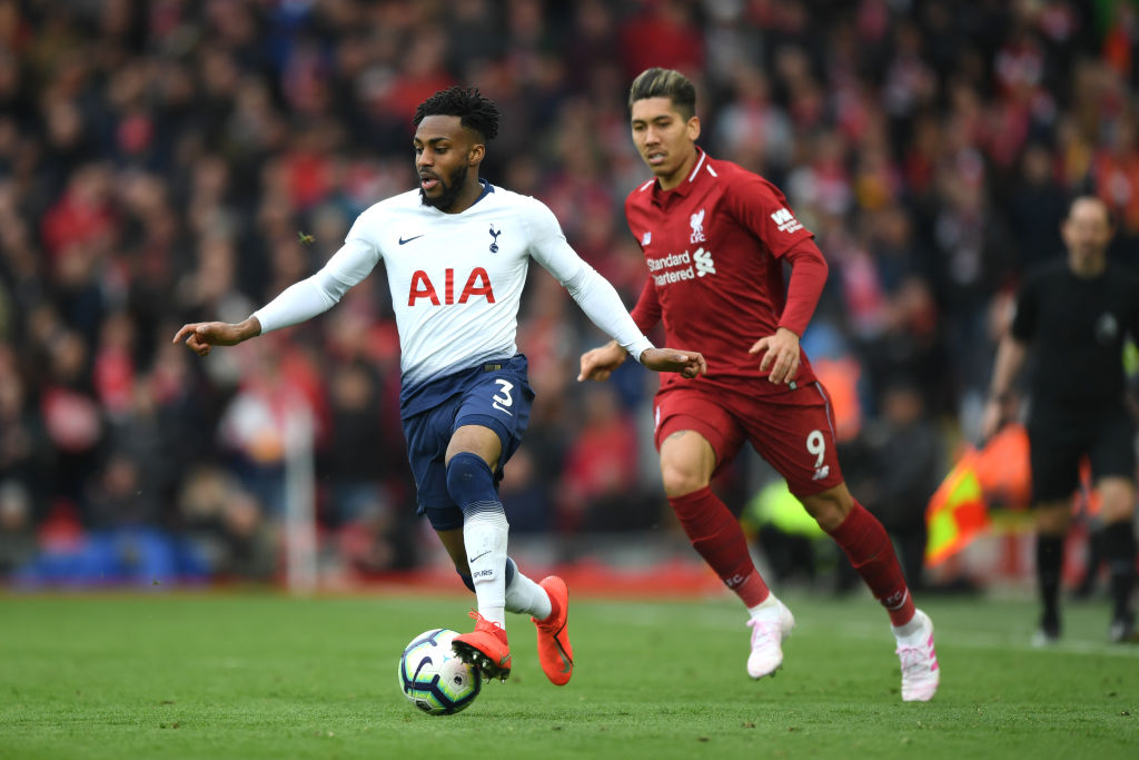 LIVERPOOL, ENGLAND - MARCH 31: Danny Rose of Tottenham Hotspur is close down by Roberto Firminho of Liverpool during the Premier League match between Liverpool FC and Tottenham Hotspur at Anfield on March 31, 2019 in Liverpool, United Kingdom. (Photo by Shaun Botterill/Getty Images) thegrio.com