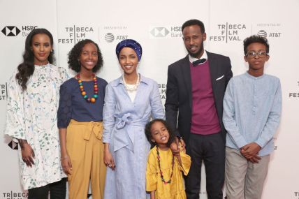 NEW YORK, NY - APRIL 21: Amal Sabrie, Isra Hirsi, Ilhan Omar, Ilwad Hirsi, Ahmed Hirsi, Adnan Hirsi attend the premiere of "Time For Ilhan" during the 2018 Tribeca Film Festival at Cinepolis Chelsea on April 21, 2018 in New York City. (Photo by Astrid Stawiarz/Getty Images for Tribeca Film Festival) thegrio.com
