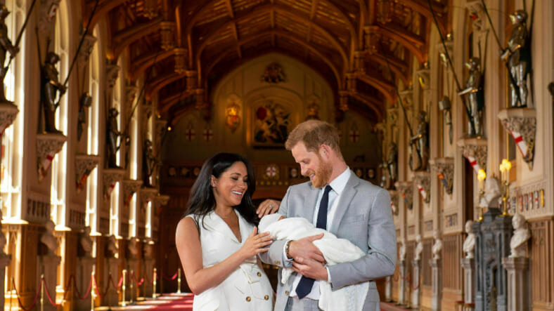 Britain's Prince Harry and Meghan, Duchess of Sussex, during a photocall with their newborn son, in St George's Hall at Windsor Castle, Windsor, south England, Wednesday May 8, 2019. Baby Sussex was born Monday at 5:26 a.m. (0426 GMT; 12:26 a.m. EDT) at an as-yet-undisclosed location. An overjoyed Harry said he and Meghan are "thinking" about names. (Dominic Lipinski/Pool via AP) thegrio.com