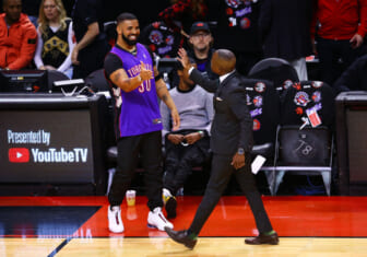 Rapper Drake is seen wearing a Dell Curry jersey before Game One of the 2019 NBA Finals between the Golden State Warriors and the Toronto Raptors at Scotiabank Arena on May 30, 2019 in Toronto, Canada. NOTE TO USER: User expressly acknowledges and agrees that, by downloading and or using this photograph, User is consenting to the terms and conditions of the Getty Images License Agreement. (Photo by Vaughn Ridley/Getty Images)