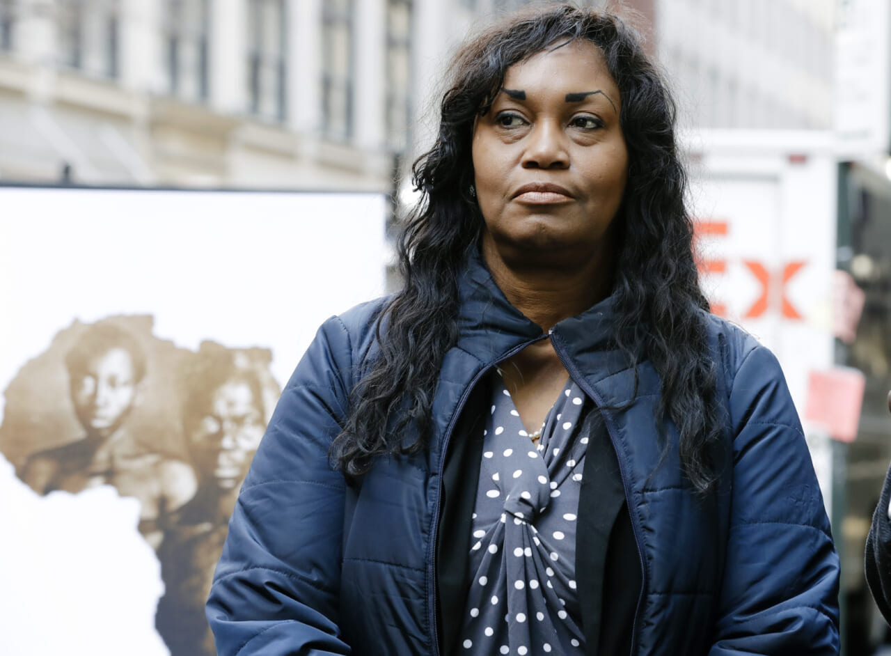 In this March 20, 2019 file photo Tamara Lanier attends a news conference near the Harvard Club, in New York. Lanier, of Norwich, Conn., is suing the Harvard University for "wrongful seizure, possession and expropriation" of images she says depict two of her ancestors. Descendants of a Harvard professor who commissioned a series of 1850 photos of slaves say they're backing the lawsuit against the university. (AP Photo/Frank Franklin II, File)