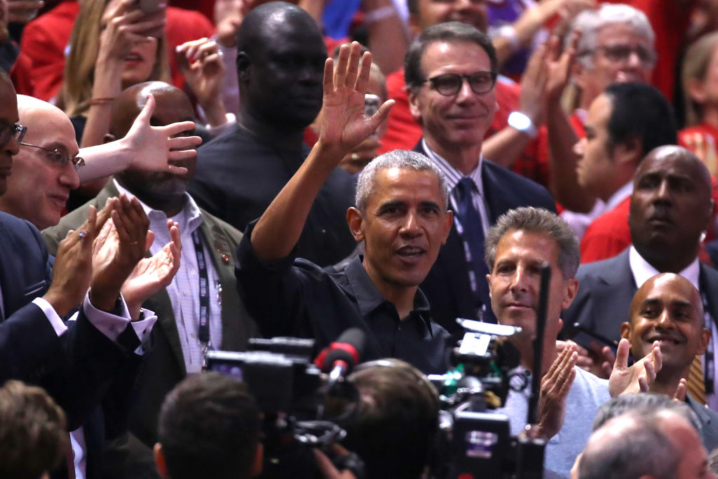 Former President of the United States, Barack Obama waves to the crowd during Game Two of the 2019 NBA Finals between the Golden State Warriors and the Toronto Raptors at Scotiabank Arena on June 02, 2019 in Toronto, Canada. NOTE TO USER: User expressly acknowledges and agrees that, by downloading and or using this photograph, User is consenting to the terms and conditions of the Getty Images License Agreement. (Photo by Gregory Shamus/Getty Images)