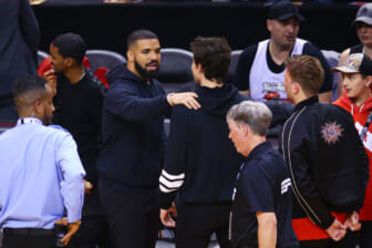Drake and Shawn Mendes meet during Game Two of the 2019 NBA Finals between the Golden State Warriors and the Toronto Raptors at Scotiabank Arena on June 02, 2019 in Toronto, Canada. NOTE TO USER: User expressly acknowledges and agrees that, by downloading and or using this photograph, User is consenting to the terms and conditions of the Getty Images License Agreement. (Photo by Vaughn Ridley/Getty Images)