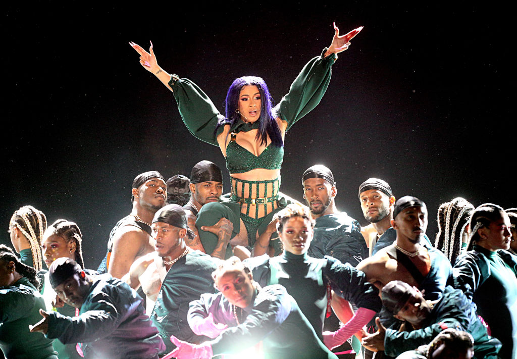 LOS ANGELES, CALIFORNIA - JUNE 23: Cardi B (C) performs onstage at the 2019 BET Awards at Microsoft Theater on June 23, 2019 in Los Angeles, California. (Photo by Frederick M. Brown/Getty Images for BET)