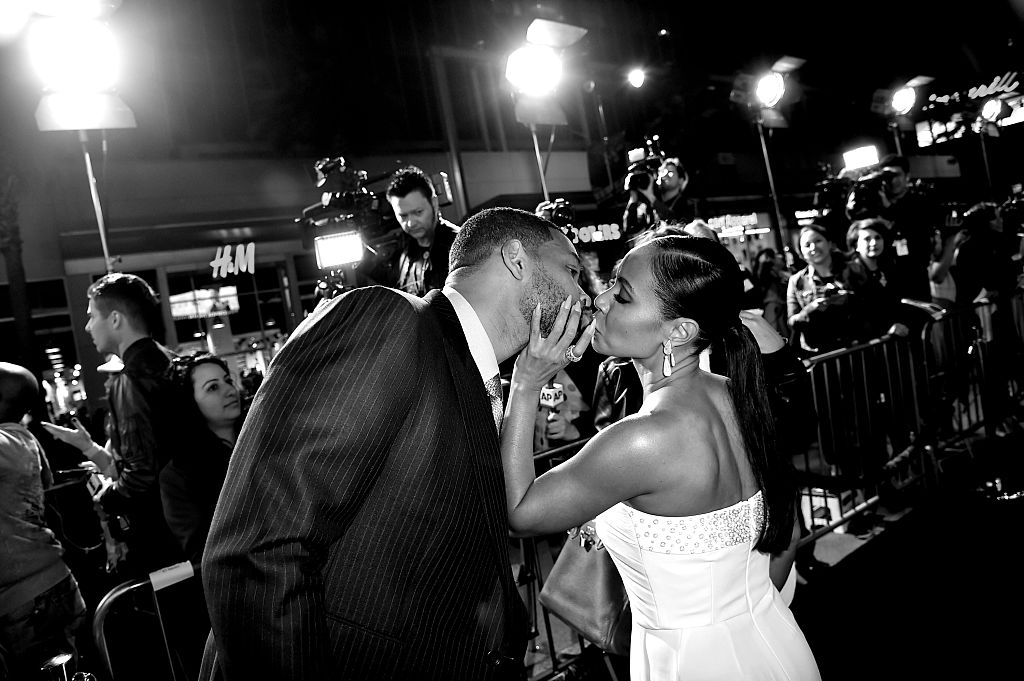 Actors Will Smith (L) and his wife Jada Pinkett Smith arrive at the premiere of Warner Bros. Pictures' "Focus" at the Chinese Theatre on February 24, 2015 in Los Angeles, California. (Photo by Kevin Winter/Getty Images)