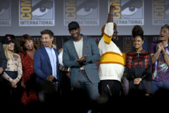 SAN DIEGO, CALIFORNIA - JULY 20: (L-R) Florence Pugh, Cate Shortland, Jeremy Renner, Mahershala Ali, Brian Tyree Henry, Tessa Thompson and Taika Waititi speak at the Marvel Studios Panel during 2019 Comic-Con International at San Diego Convention Center on July 20, 2019 in San Diego, California. (Photo by Kevin Winter/Getty Images)
