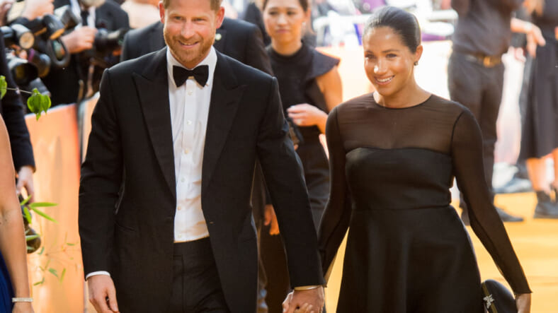 Prince Harry, Duke of Sussex and Meghan, Duchess of Sussex attend "The Lion King" European Premiere at Leicester Square on July 14, 2019 in London, England. (Photo by Samir Hussein/WireImage) thegrio.com