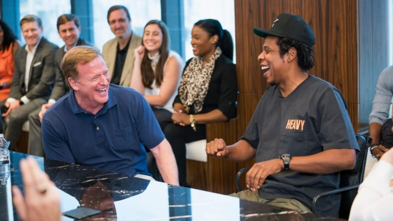 NFL Commissioner Roger Goodell, left, and Jay-Z appear at a news conference at ROC Nation on Wednesday, Aug. 14, 2019 in New York. The NFL and ROC Nation, Jay-Z’s entertainment and sports representation company, announced Tuesday they were teaming up for events and social activism, a deal Jay-Z said had been in the works over the last seven months. (Ben Hider/AP Images for NFL) thegrio.com