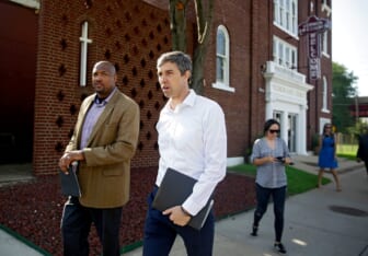 Presidential candidate Beto O'Rourke(right) and Rev. Robert L. Turner Sr. pass the the Vernon AME Church while on a tour of the Greenwood District Monday, Aug. 19, 2019. MIKE SIMONS/Tulsa World