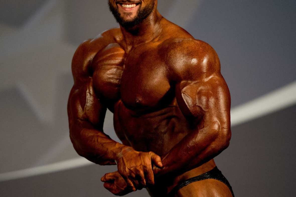 An athlete poses for the judges during the bodybuilding competition