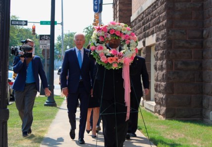 Former Vice President and presidential candidate Joe Biden, center left, joins Sen. Doug Jones and Birmingham Mayor Randall Woodfin at a wreath laying after a service at 16th Street Baptist Church in Birmingham, Ala., Sunday, Sept. 15, 2019. Visiting the black church bombed by the Ku Klux Klan in the civil rights era, Democratic presidential candidate Biden said Sunday the country hasn't "relegated racism and white supremacy to the pages of history" as he framed current tensions in the context of the movement's historic struggle for equality. (Ivana Hrynkiw/The Birmingham News via AP) thegrio.com