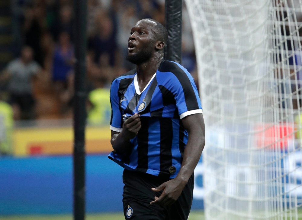 Inter Milan's Romelu Lukaku celebrates after scoring his side's third goal during the Serie A soccer match between Inter Milan and Lecce at the San Siro stadium, in Milan, Italy, Monday, Aug. 26, 2019. (AP Photo/Luca Bruno) thegrio.com