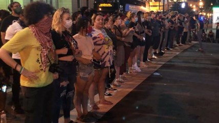 White women in Louisville line up to form human shield to protect Black protesters