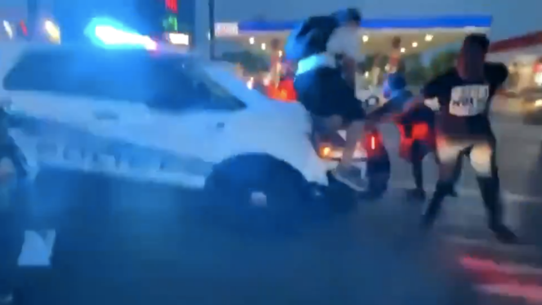 Detroit police officer drives SUV into crowd of protesters