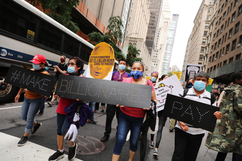 Activists March In Manhattan Calling For A Tax On Billionaires