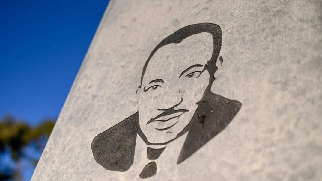 A stylized image of Martin Luther King Jr. on the obelisk at the Dr. Martin Luther King, Jr. Memorial Tree Grove