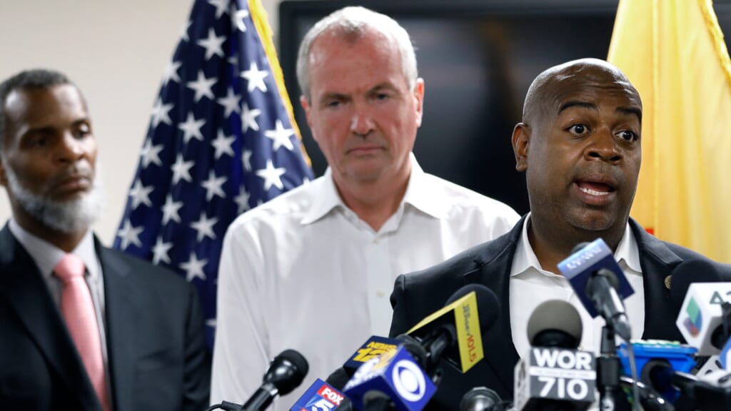 Kareem Addem, acting director of Water and Sewer Utilities, NJ Governor Phil Murphy and Newark Mayor Ras Baraka 