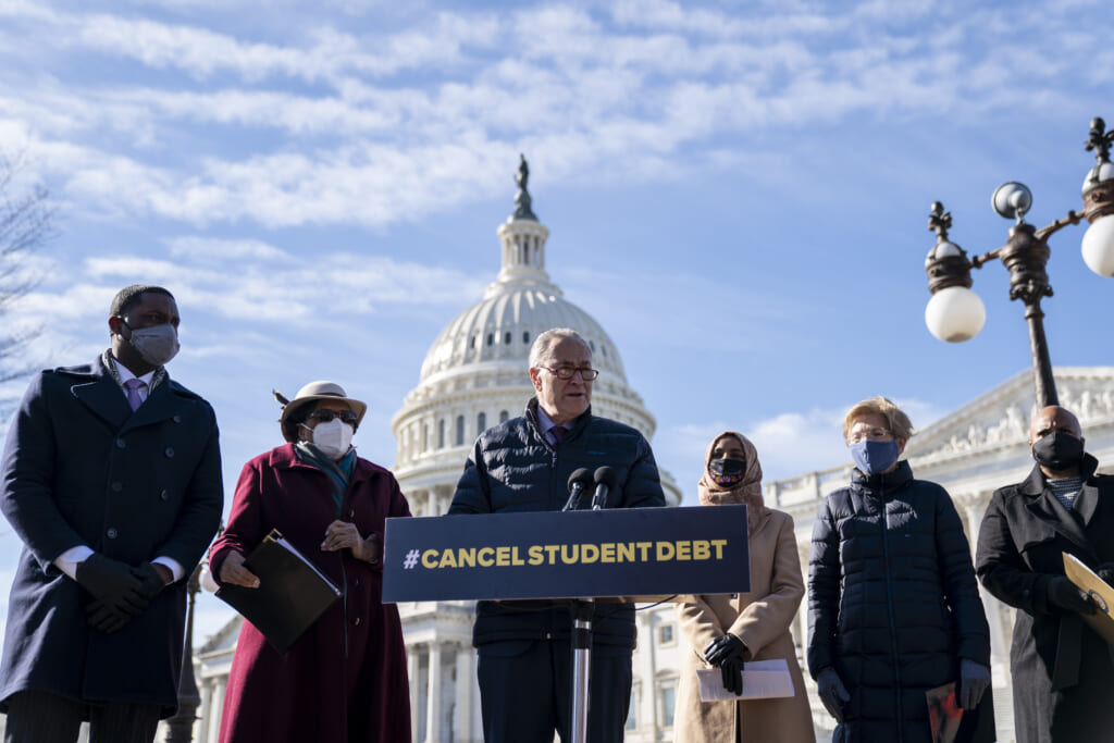 Democratic Senator Chuck Schumer of New York speaks at a podium