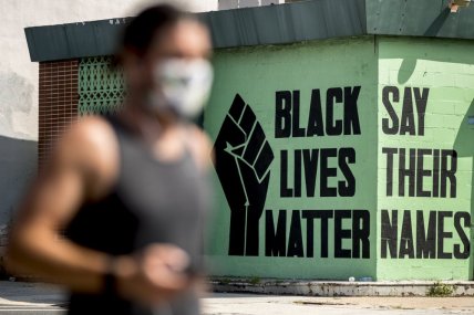 Judge awards Black church $1 million after BLM banner burned by Proud Boys during protest