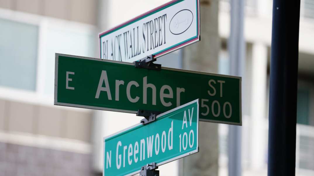 Tulsa "Black Wall Street" sign is seen during the Juneteenth celebration