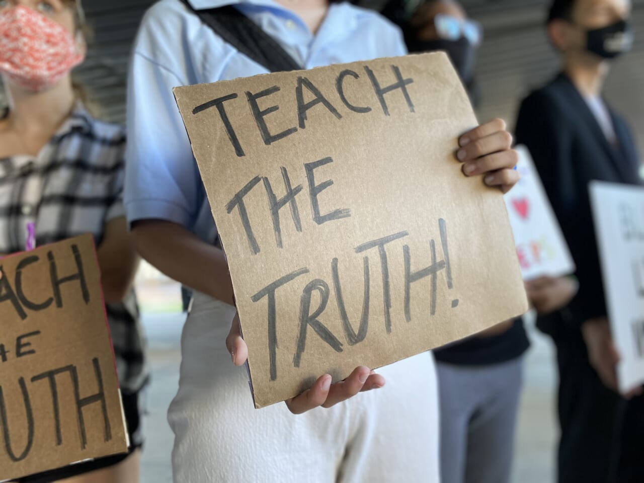 Students and community members gather for an education protest