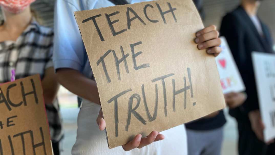 Students and community members gather for an education protest