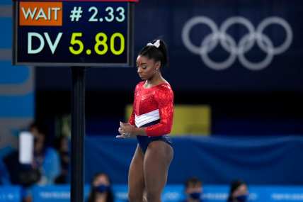 Simone Biles out of vault and bars, may still do floor exercise and beam