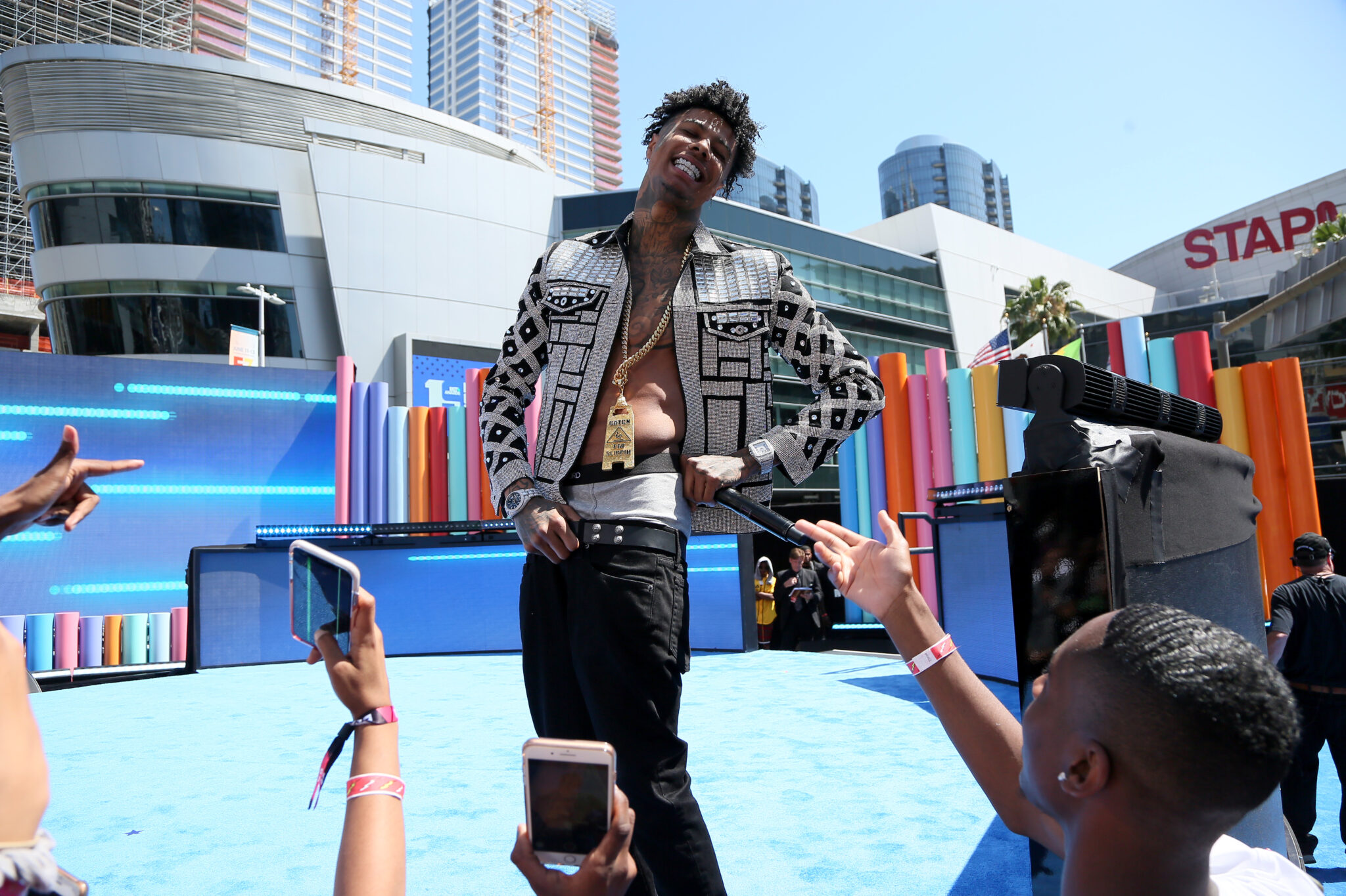 Rapper Blueface attacked by fan after exhibition boxing match TheGrio