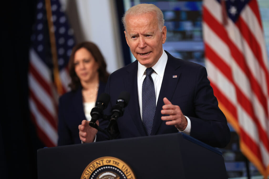 U.S. President Joe Biden (R) delivers remarks with Vice President Kamala