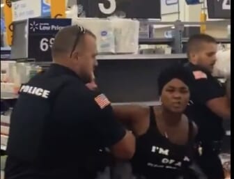 New York police officer punches woman in the throat during an arrest