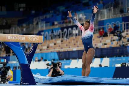 Simone Biles wins bronze on beam in return to Olympic competition