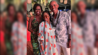 Former President and First Lady Barack and Michelle Obama pose with singer H.E.R. at his 60h birthday party in Martha's Vineyard