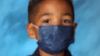 Son wears mask in school picture after mom tells him to keep it on: ‘I listen to my mom’