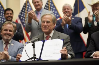 Texas governor signs new GOP voting suppression bill into law