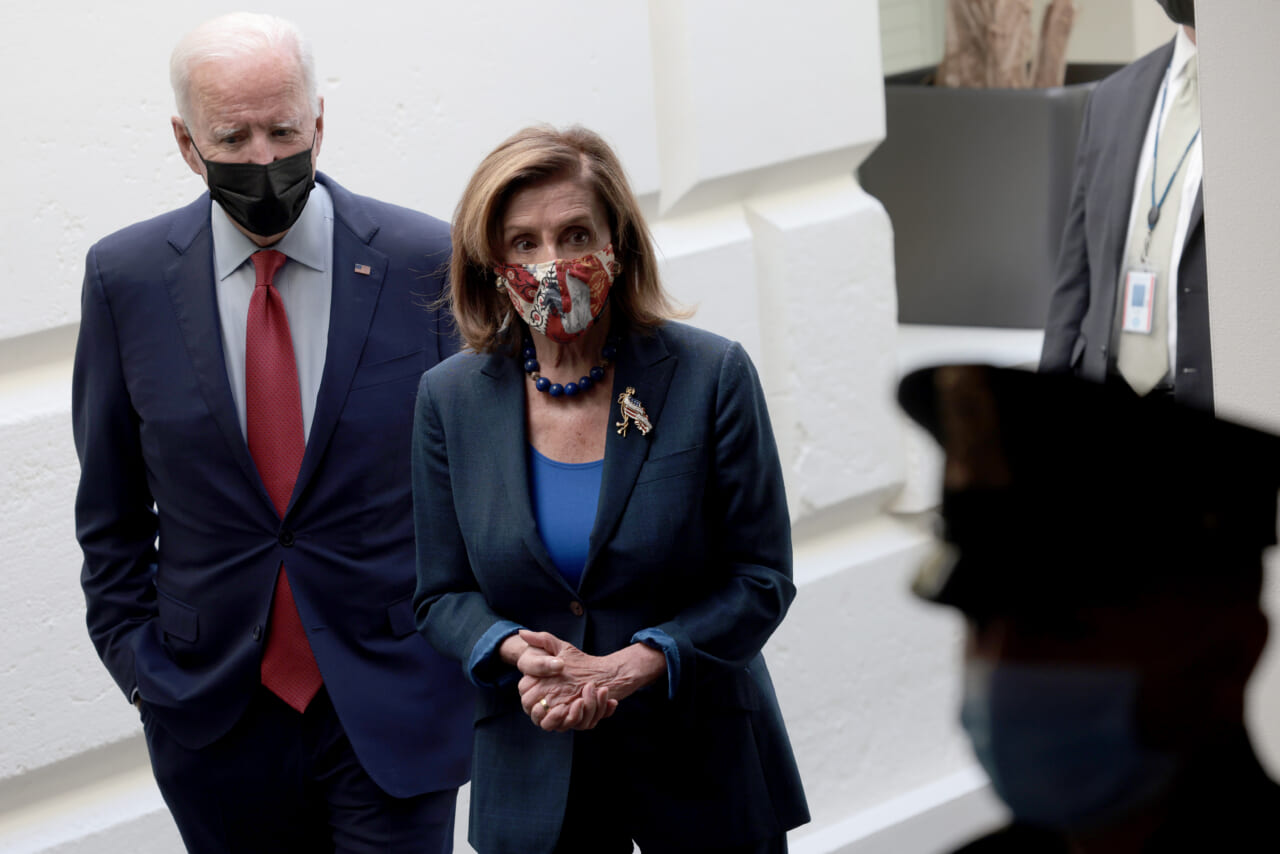 U.S. President Joe Biden, accompanied by Speaker of the House Nancy