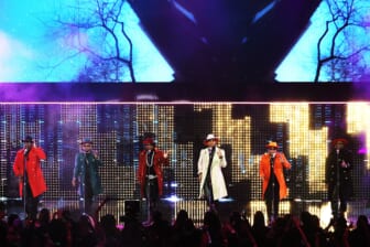 New Edition performs at the American Music Awards alongside NKOTB