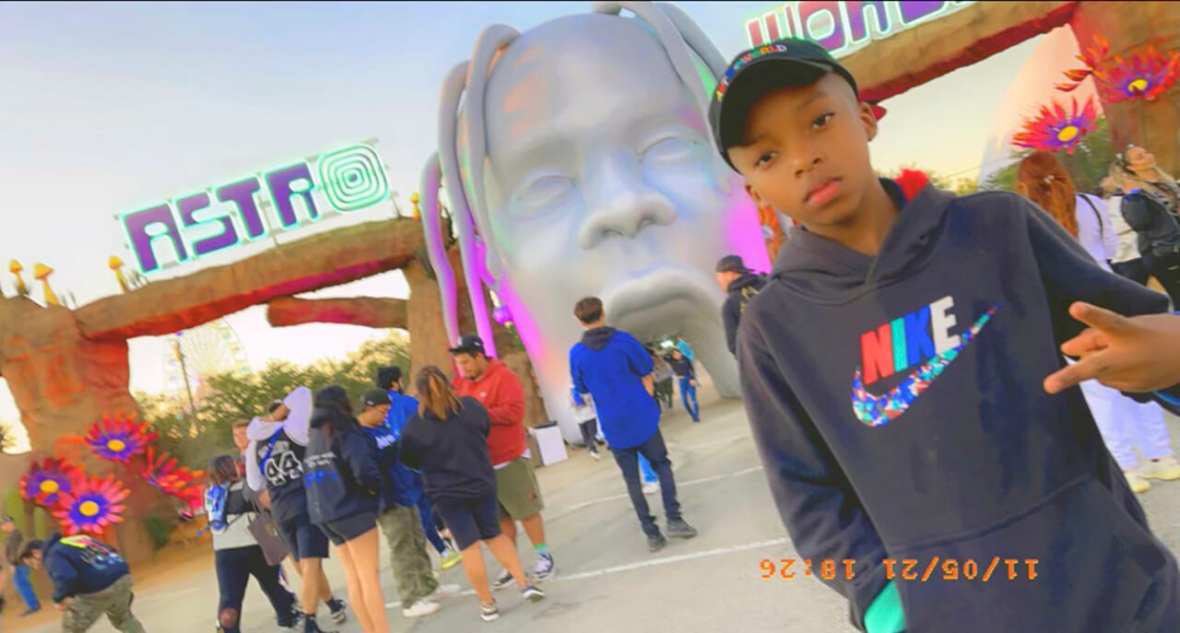 Ezra Blount, 9, posing outside the Astroworld music festival