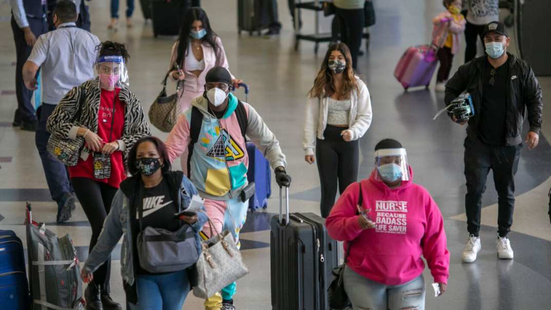 Holiday travelers at airport