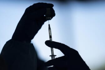 Group: Tax rich to fund vaccines for poor hit by pandemic