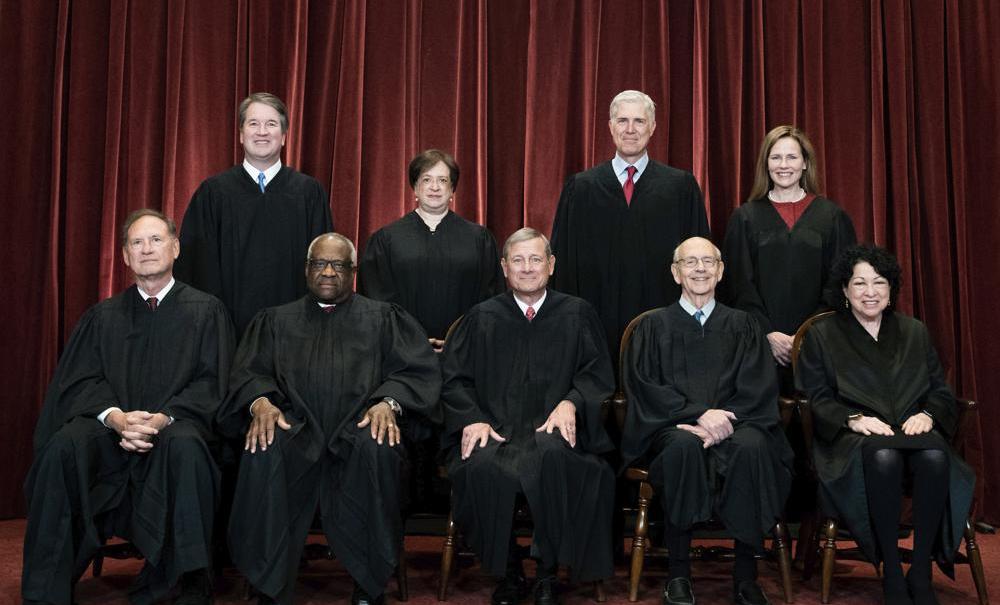 The nine members of the Supreme Court in 2021 in their black judicial robes