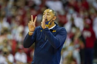 Michigan’s Howard hits Wisconsin assistant after Badgers win