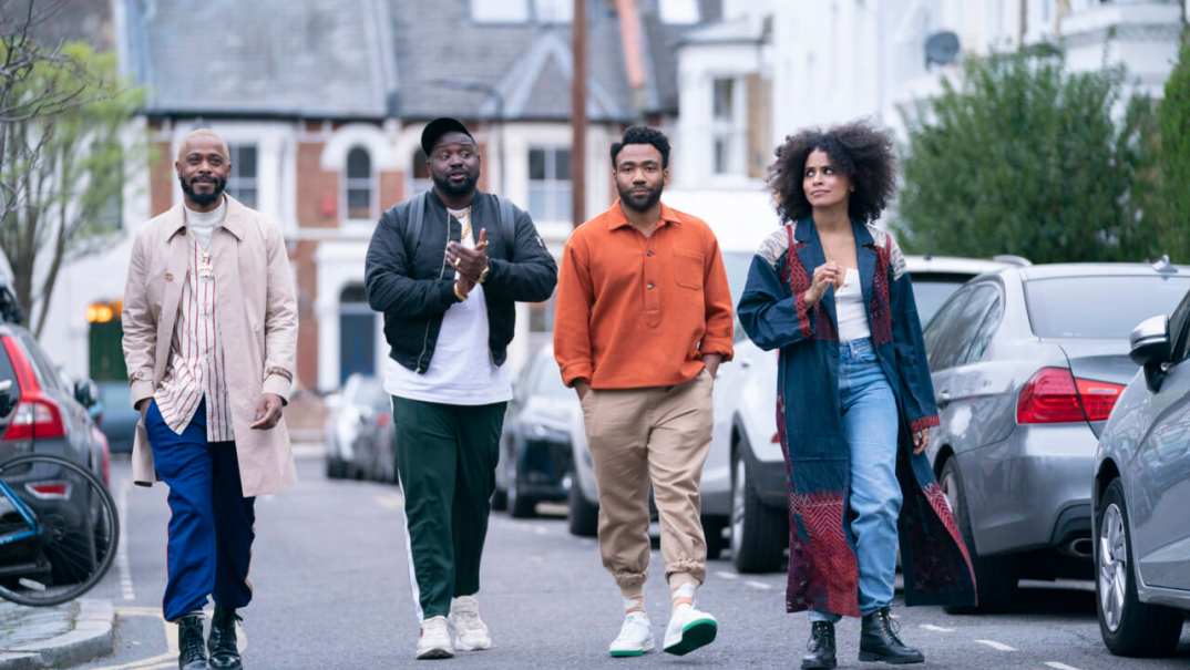 Actors LaKeith Stanfield, Brian Tyree Henry, Donald Glover and Zazie Beetz wearing casual outdoor clothing