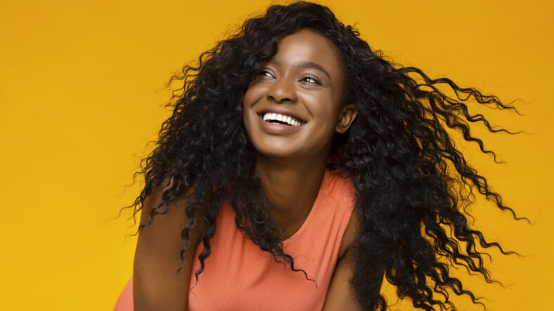 Young Black woman laughing