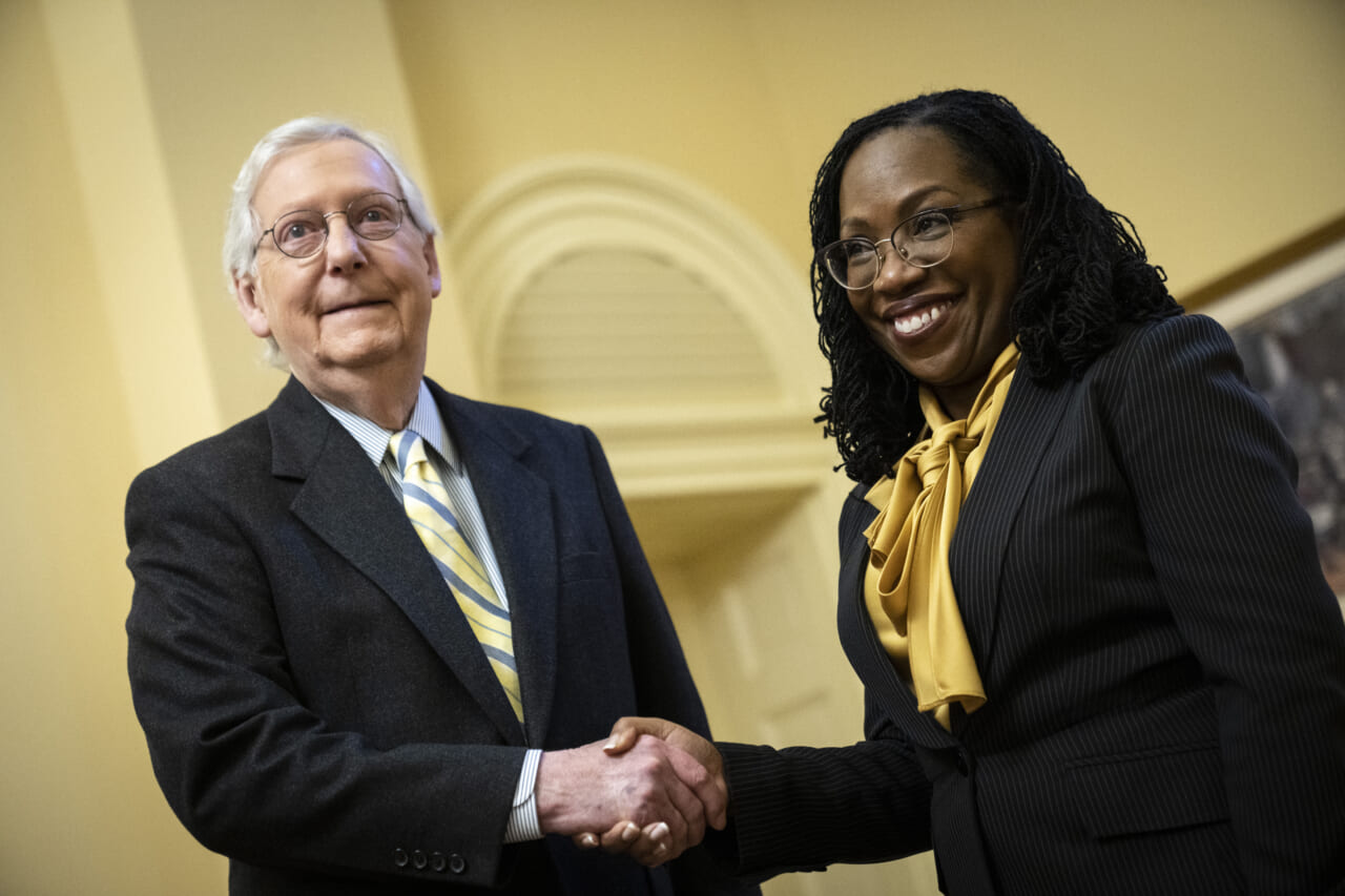 Senate Minority Leader Mitch McConnell (R-Ky.) shakes hands with Supreme Court Nominee Judge Ketanji Brown Jackson