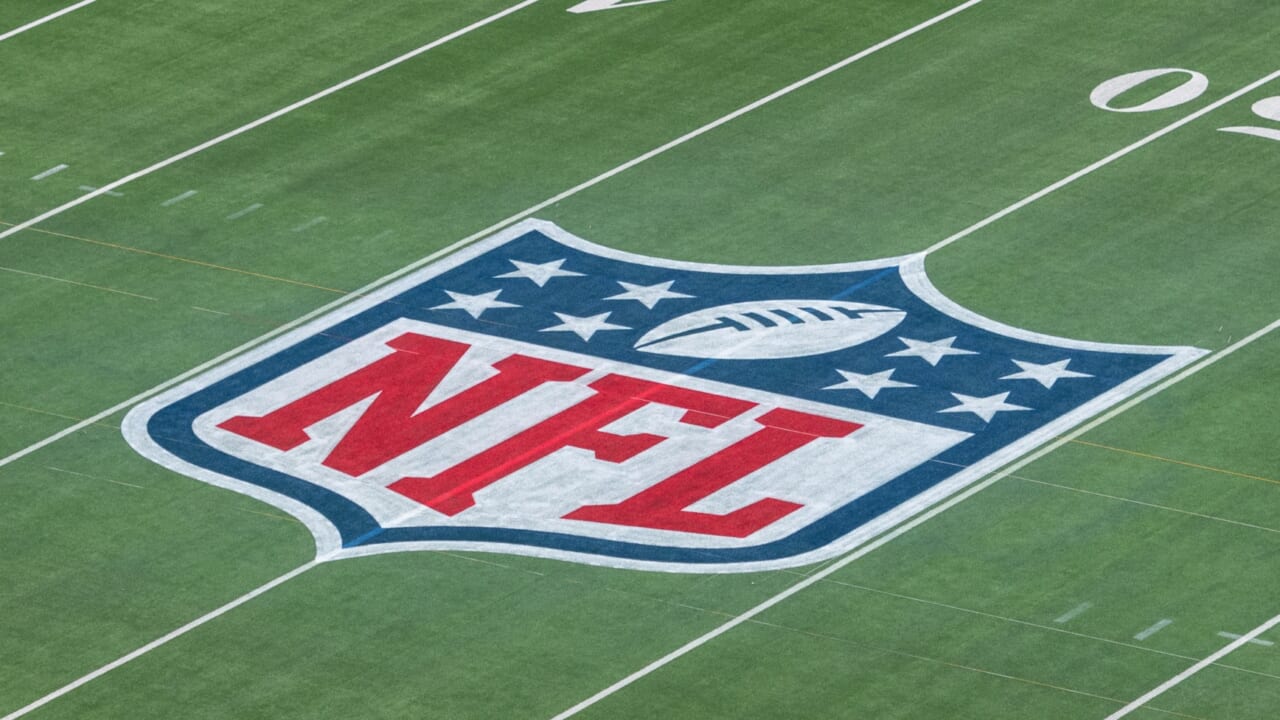 The NFL logo on a football field